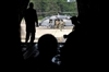 U.S. airmen wait aboard an HC-130P Hercules aircraft for pararescuemen assigned to the 38th Rescue Squadron to load simulated patients during a mass casualty exercise on Moody Air Force Base, Ga., June 27, 2008.