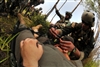 U.S. Air Force Staff Sgt. Daniel Houghton writes down a patient's vitals during a mass casualty exercise on Moody Air Force Base, Ga., June 27, 2008. 