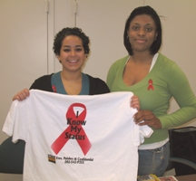 Representatives from Metro Teen AIDS urge people to be tested for HIV at the World AIDS Day event.