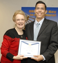 2005 Scholar Carlos Mena receives his certificate from Dr. Duke.