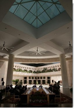 President George W. Bush meets with a young entrepreneurs Friday, March 3, 2006, at the Indian School of Business Learning Resource Center in Hyderabad, India.  White House photo by Eric Draper