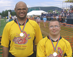 Athletes Aaron Armstead and Robert Deckert at a recent Special Olympics competition at Penn State.