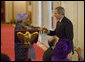 President George W. Bush toast Liberia's President Ellen Johnson Sirleaf, Tuesday, March 21, 2006, at a social luncheon at the White House in honor of President Sirleaf. White House photo by Eric Draper