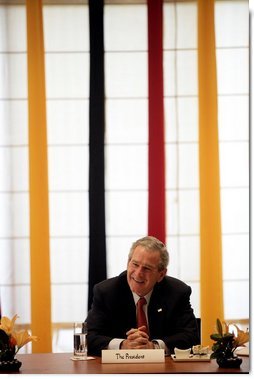 President George W. Bush smiles as he meets with religious leaders of India Thursday, March 2, 2006, in New Delhi.  White House photo by Eric Draper