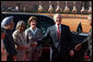 President George W. Bush shakes the hand of India's President A.P.J. Abdul Kalam as he and Mrs. Laura Bush are greeted upon their arrival at Rashtrapati Bhavan, the President's official residence in New Delhi Thursday, March 2, 2006. Also present are Prime Minister Manmohan Singh and his wife, Gusharan Kaur. White House photo by Paul Morse