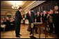 President George W. Bush shakes hands with Ukrainian Ambassador Oleh Shamshur, after President Bush signed H.R. 1053, to authorize the Extension of Nondiscriminatory Treatment to the Products of Ukraine, Thursday, March 23, 2006, in the Eisenhower Executive Office Building in Washington. President Bush was joined at the ceremony by legislators, U.S. Sen. Richard Lugar, R- Ind.; U.S. Rep. Jim Gerlach, R-Pa.; U.S. Rep. Tom Lantos, D-Calif.; U.S. Rep. Candice Miller, R-Mich; U.S. Rep. Curt Weldon, R-Pa., and U.S. Rep. Mike Fitzpatrick, R-Pa. White House photo by Kimberlee Hewitt