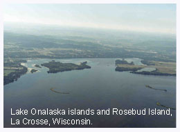 Aerial photo of two islands in a large body of water.