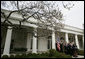 President George W. Bush and members of his Cabinet face the media Tuesday, March 28, 2006, in the Rose Garden of the White House. White House photo by Eric Draper