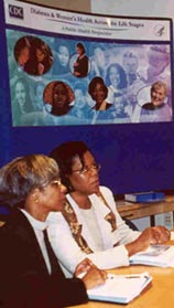 A photo of Gloria Beckles, left, and Patricia Thompson-Reid, co-editors of Diabetes and Women's Health Across the Life Stages: A Public Health Perspective, at the women's task force meeting.