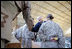 Vice President Dick Cheney attends a rally with US troops at Al-Asad Airbase in Iraq, Dec. 18, 2005.