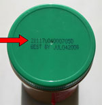 peanut butter jar lid with arrow pointing to product code