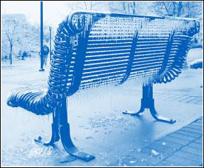 Image of freezing ice on a park bench