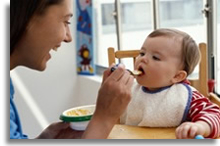 Mother feeding baby