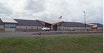 photo of the office exterior in the winter snow.