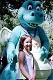 Ord, the blue dragon from the PBS series Dragon Tales, meets a fan on the Capitol lawn