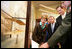 Mrs. Laura Bush, U.S.Senator. Mike DeWine, and U.S.Rep. Mike Turner listen to National Park Ranger Larry Blake as he shows them a model of the Wright Brothers airplane during a tour of the Dayton Aviation Heritage National Historical Park in the Wright-Dunbar Village, a Preserve America neighborhood, in Dayton, Ohio, Wednesday, August 16, 2006. Also shown is Fran DeWine, wife of Sen. Mike DeWine. White House photo by Shealah Craighead 