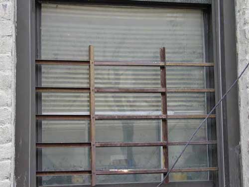 Photo 3. Child Guard Gate on Apartment Windows