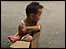 A child in a cardboard box in Beijing