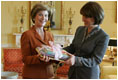 Laura Bush presents Mrs. Zorka Parvanova, First Lady of the Republic of Bulgaria, Monday, October 17, 2005, with signed children's books for the shelves of Sofia City Public Library in Sofia City, Bulgaria.