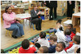 Laura Bush joins pre-school teacher Georgianna Ragland's class in a song during her visit to the Germantown Boys and Girls Club Tuesday, Feb. 3, 2005 in Philadelphia. Mrs Bush highlighted the importance of programs that support youth, especially at-risk boys.