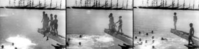 A group of boys leap off a pier and into the water near Honolulu, filmed by Robert Bonine for the American Mutoscope & Biograph Co. 