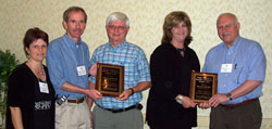 Dr. Maryann Redford, left, NEI project officer for the ETROP Study, joining Dr. William Good, principal investigator (PI) from the study headquarters in San Francisco, and Dr. Robert Hardy, far right, PI from the coordinating center in Houston, in presenting ETROP Inspiration Awards to Dr. Robert Gordon, PI in the New Orleans study center, and to Debbie Neff, New Orleans study center coordinator.