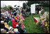 Mrs. Laura Bush reads a story to children attending the 2006 White House Easter Egg Roll, Monday, April 17, 2006 on the South Lawn of the White House. White House photo by Shealah Craighead