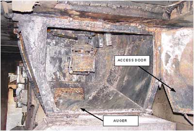 Photo 3. Auger access door in pit