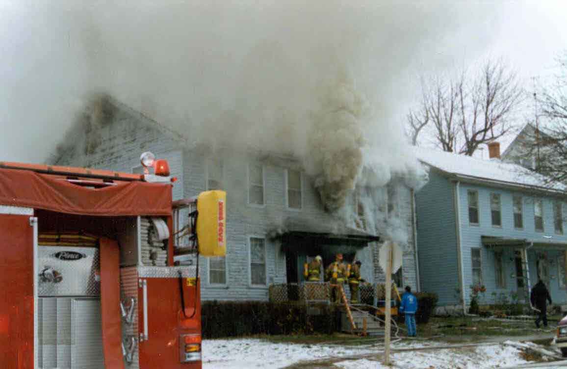 Photo 1.  Photograph of the front of the burning structure showing the entrance which the fire fighters entered.