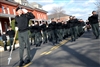 U.S. Army Master Sgt. Russell Smith, head drum major with the 3rd U.S. Infantry Regiment's Old Guard Fife and Drum Corps leads the formation down Sheridan Avenue, Jan. 9, 2009, on Fort Myer, Va., in preparation for President-elect Barack Obama’s inaugural parade Jan. 20 in Washington, D.C.