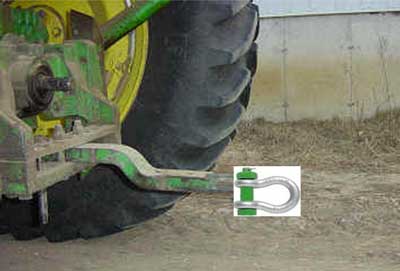 Photo 4. Shackle attached to draw bar on larger tractor (representation only).