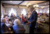 President George W. Bush talks with senior citizens at the Spring House Family Restaurant in Cedar Rapids, Iowa, March 30, 2005.