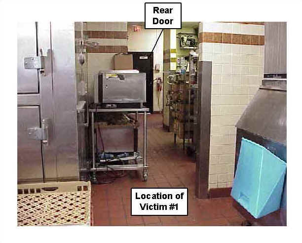 Photo 12: Pre-fire, interior view of the kitchen area of similar restaurant, showing the location of Victim #1.