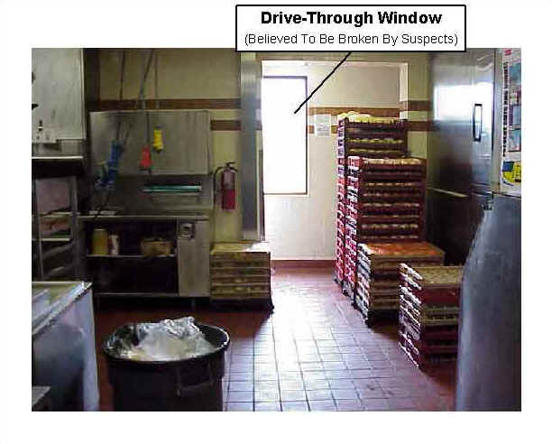 Photo 4: Pre-fire, interior view of similar drive-through window of the restaurant.