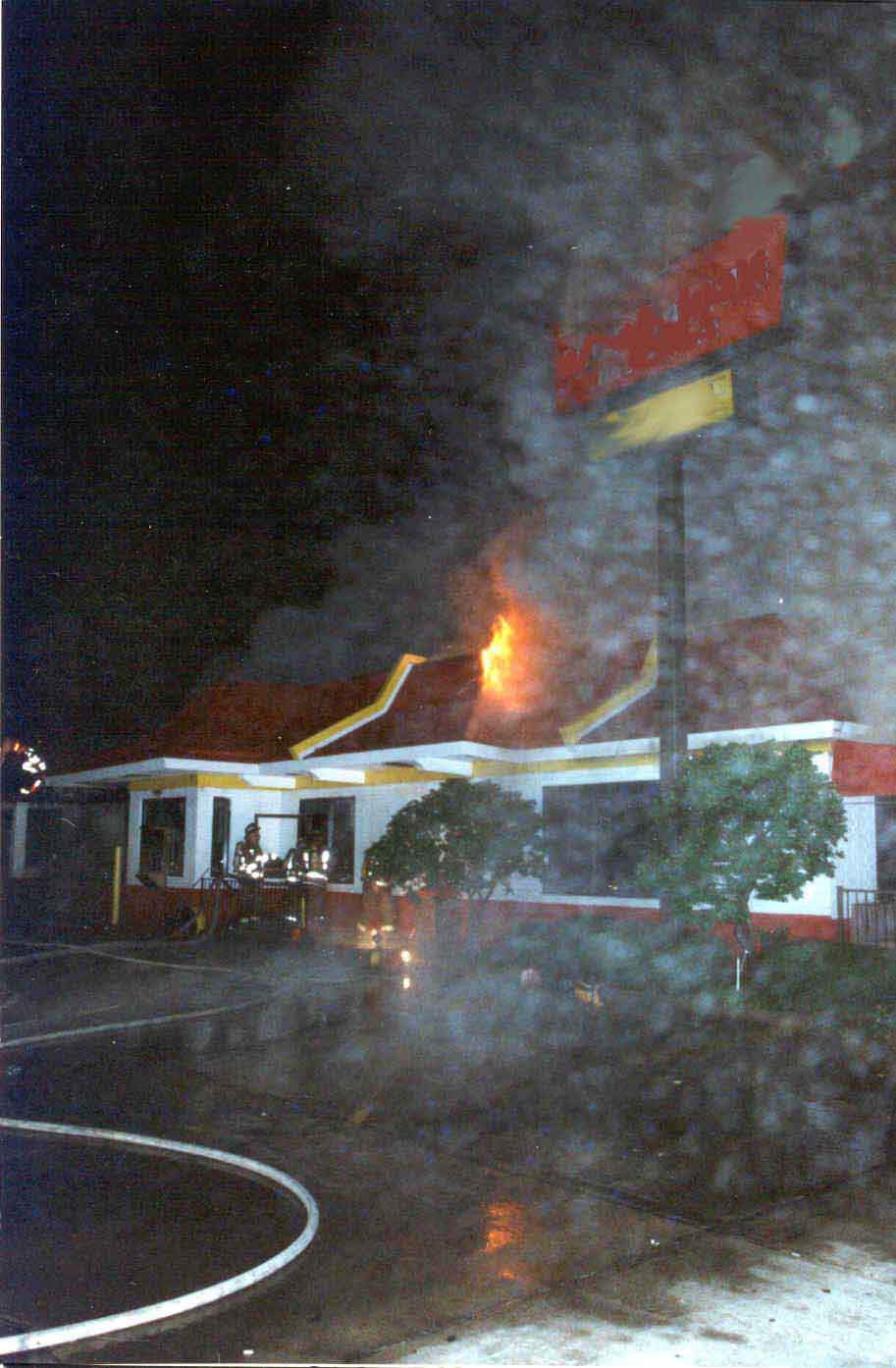 Photo 5: Exterior view of the restaurant during the early stages of the fire.