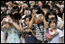 President George W. Bush and Prime Minister Junichiro Koizumi of Japan are greeted by an enthusiastic crowd of young guests during an arrival ceremony on the South Lawn Thursday, June 29, 2006.