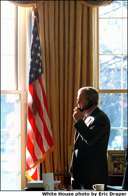 President Bush in the Oval Office, White House photo by Eric Draper.