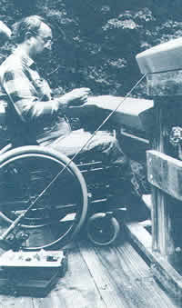photo of fisherman in wheelchair on fishing platform