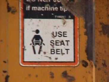 Figure 2.  Warning sign located inside of the cab.