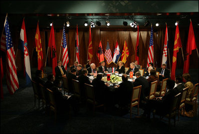 Flags of Croatia, Macedonia, Albania and the U.S. provide a colorful background as delegates from the Adriatic Charter countries meet to discuss regional issues as well as their joint aspirations for admittance into NATO and the European Community, Sunday, May 7, 2006.