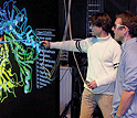 Two researchers and a 3D visualization