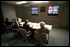 President George W. Bush, White House Chief of Staff Andy Card (left) and Admiral Richard Mies conduct a video tele-conference at Offutt Air Force Base in Nebraska, Sept. 11, 2001.