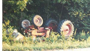 Figure 1.  Tractor overturn view from road