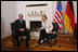 President George W. Bush meets one-on-one with German Chancellor Angela Merkel in Stralsund, Germany, Thursday, July 13, 2006.