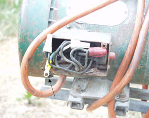 Picture #7: Portable auger motor housing opened with new ground wire.
