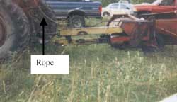 Figure 2. Rope attached to pin for flail mower