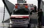 AMBULANCES DONATED - Click for high resolution Photo