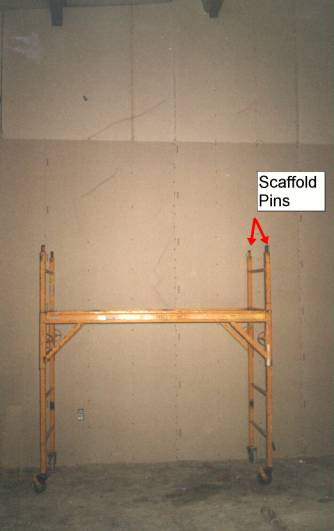scaffold 
position at the time of the fall -- arrows point to scaffold pins