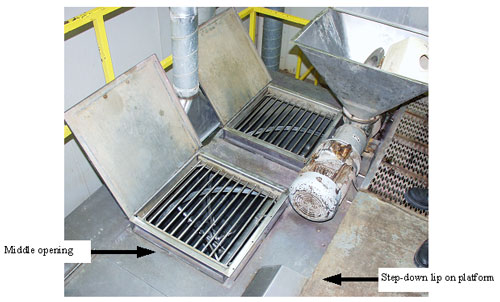 Picture #4 shows the middle grate where victim entered and the step-down between the work platform and mixer top.
