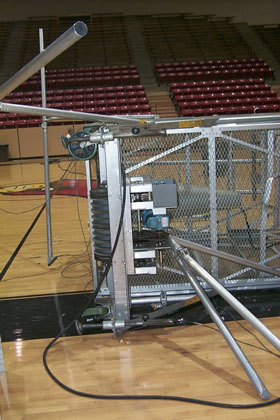 Base of telescoping lift on its side. Notice outriggers and leveling legs were in place to balance the lift.